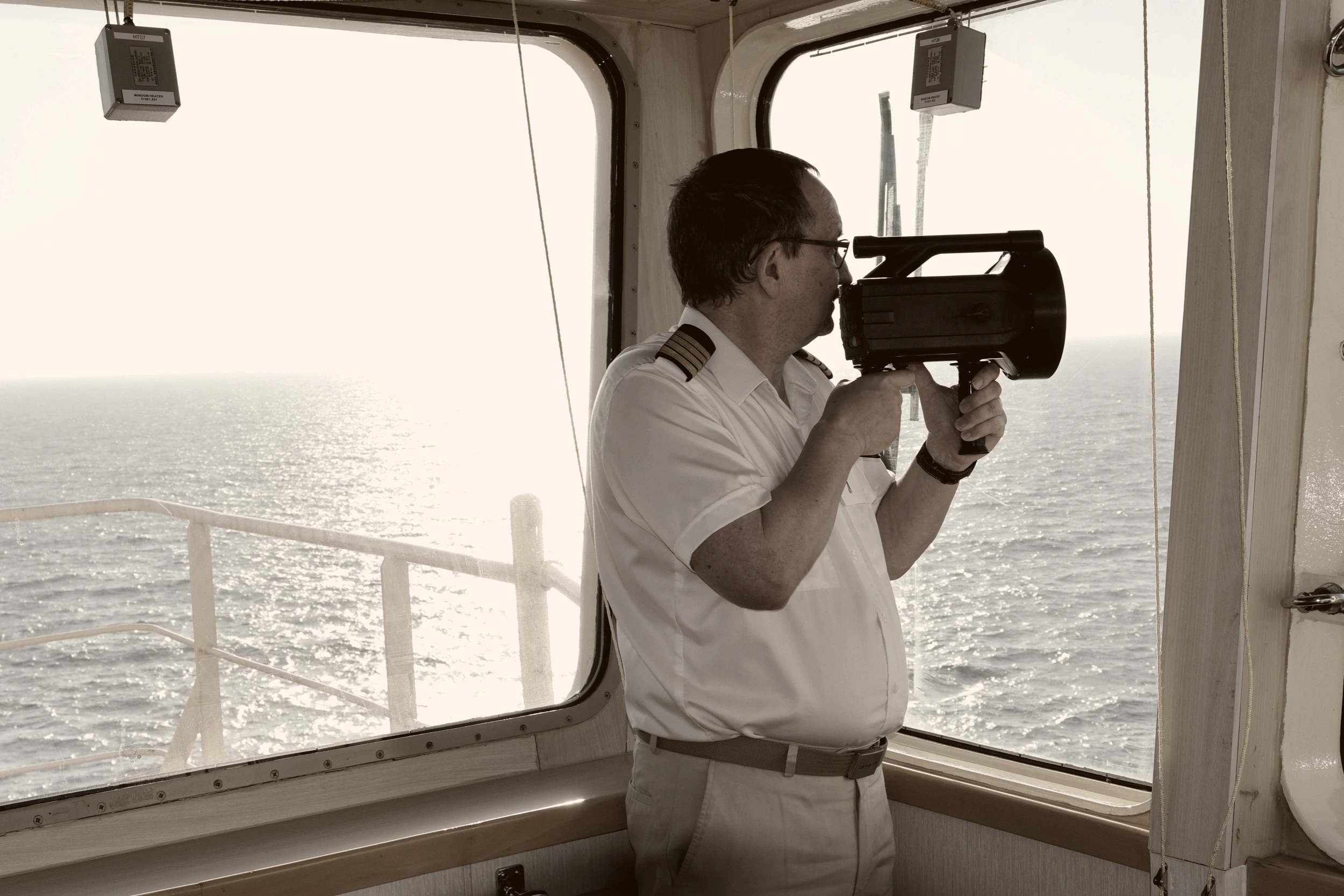 Aldis lamp in use on a ship's bridge