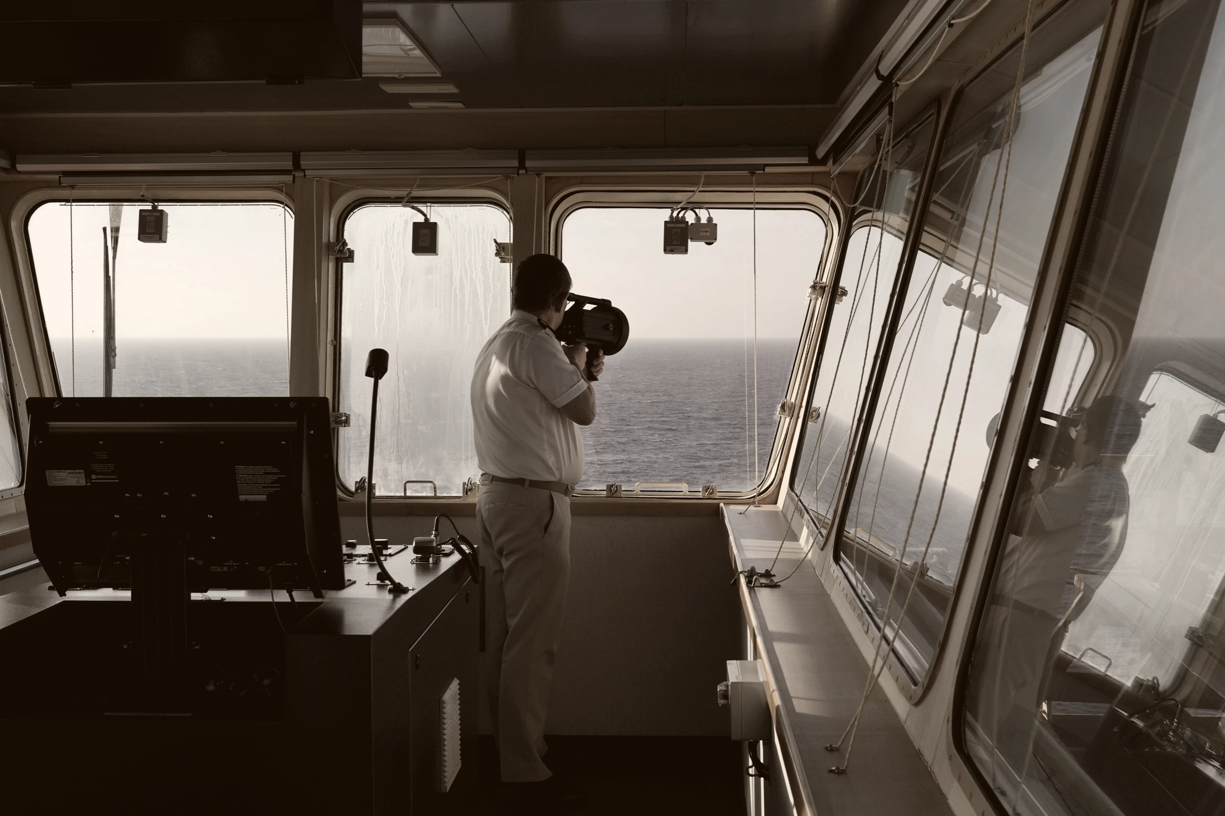 Aldis lamp in use on a ship's bridge